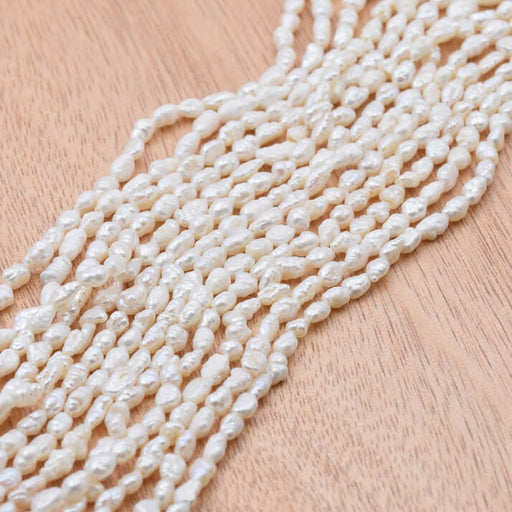 Freshwater pearl rice nugget creamy white 4-6x3mm (1strand-40cm)