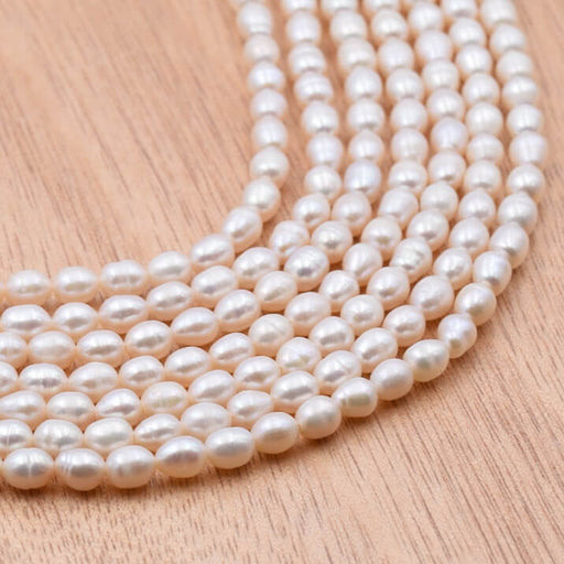 freshwater pearl Creamy white rice beads 5-6x5mm (1strand-41cm)