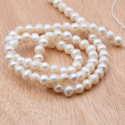 Buy Freshwater pearl potato white beige 5-5.5mm (1strand-35cm)