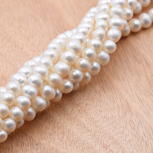 Buy White potatoe freshwater pearl 7-9x7mm (1strand-40cm)