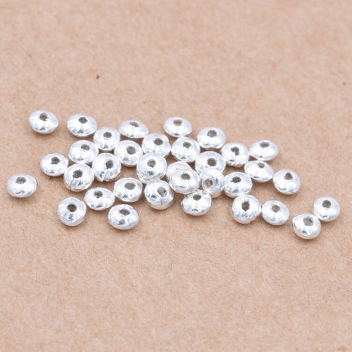 Buy Heishi rondelle bead 2x1.5mm Sterling Silver - Hole: 0.5mm (20)